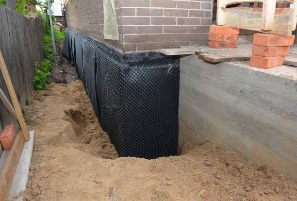 SJ Waterproofing Pros technician performing targeted Sump Pump Installation assessment in White Marsh, MD
